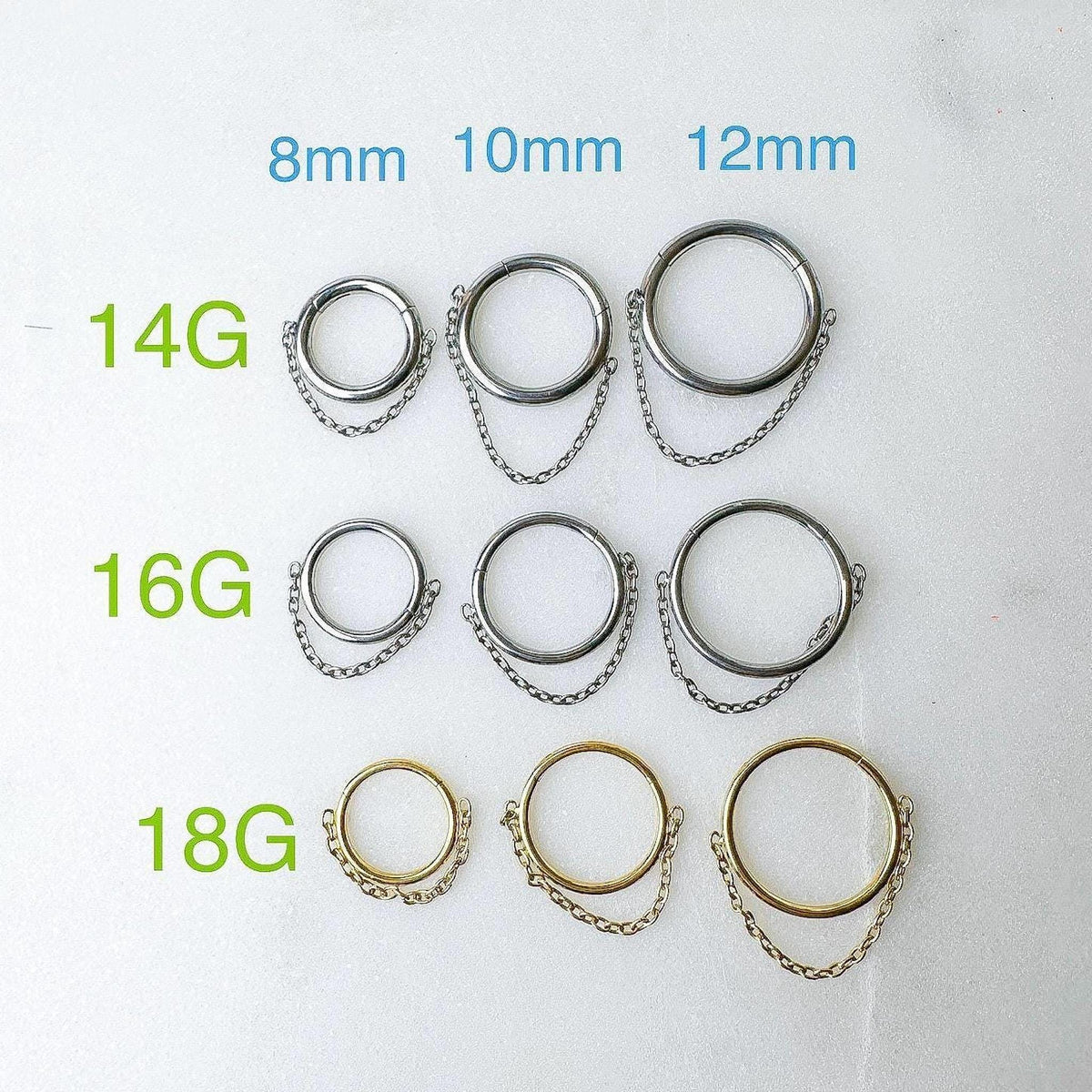 A size chart showing silver and gold hoop earrings with chain dangled across three gauge sizes of 14G, 16G, and 18G, and three diameters of 8mm, 10mm, and 12mm.